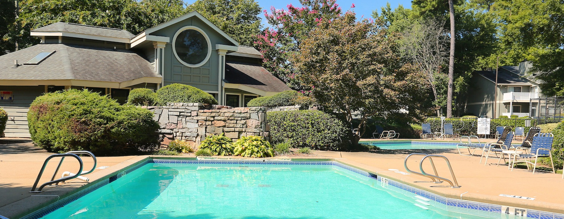 Pool area surrounded by trees
